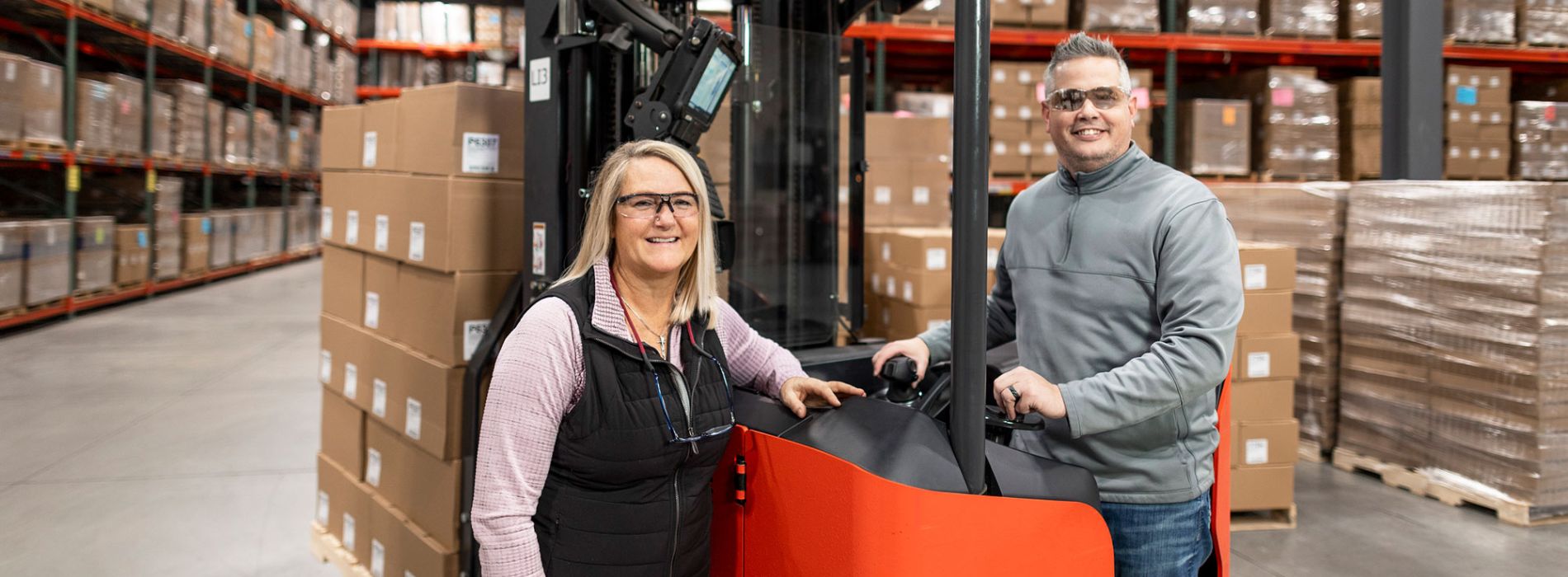 Kay and Dan in the warehouse